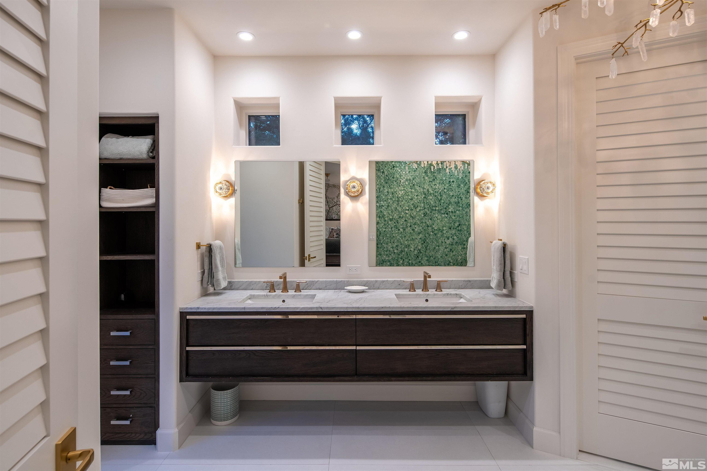4305 Juniper Trail Reno, NV 89519 - Photo 12 of 30 a bathroom with a double vanity sink and a mirror