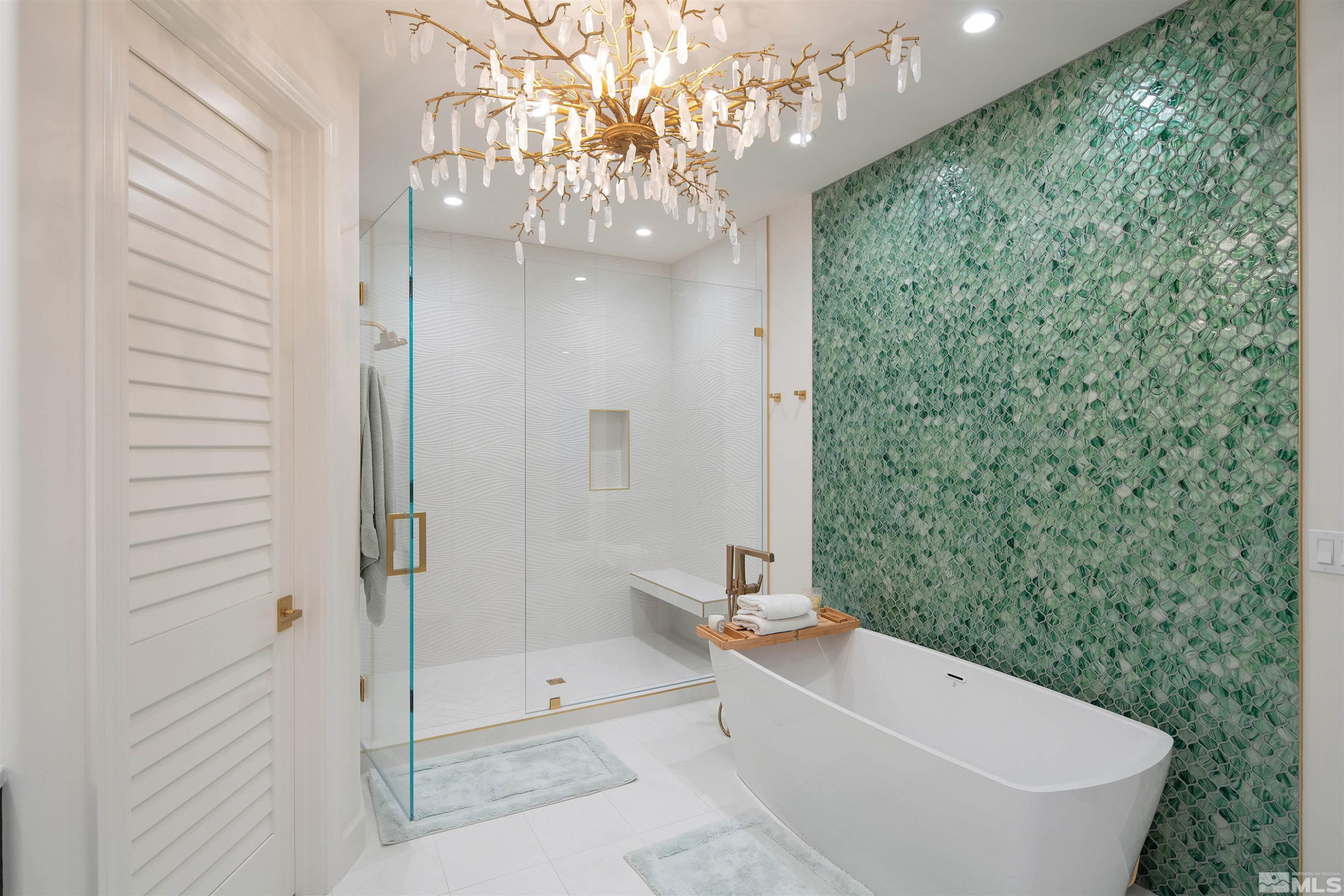 4305 Juniper Trail Reno, NV 89519 - Photo 14 of 30 a bathroom with a bathtub a toilet and a shower