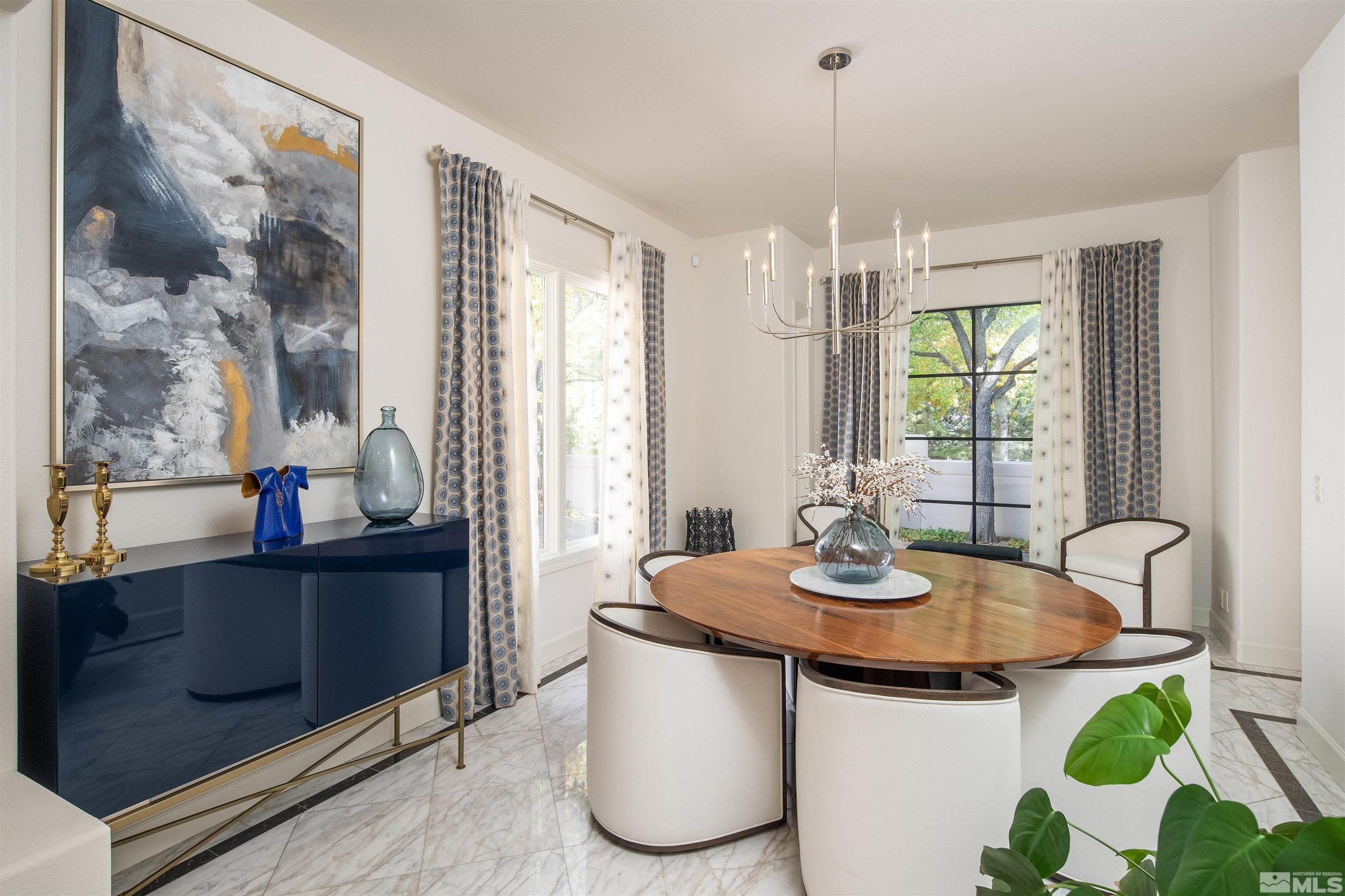 4305 Juniper Trail Reno, NV 89519 - Photo 6 of 30 a dining room with table chairs and windows
