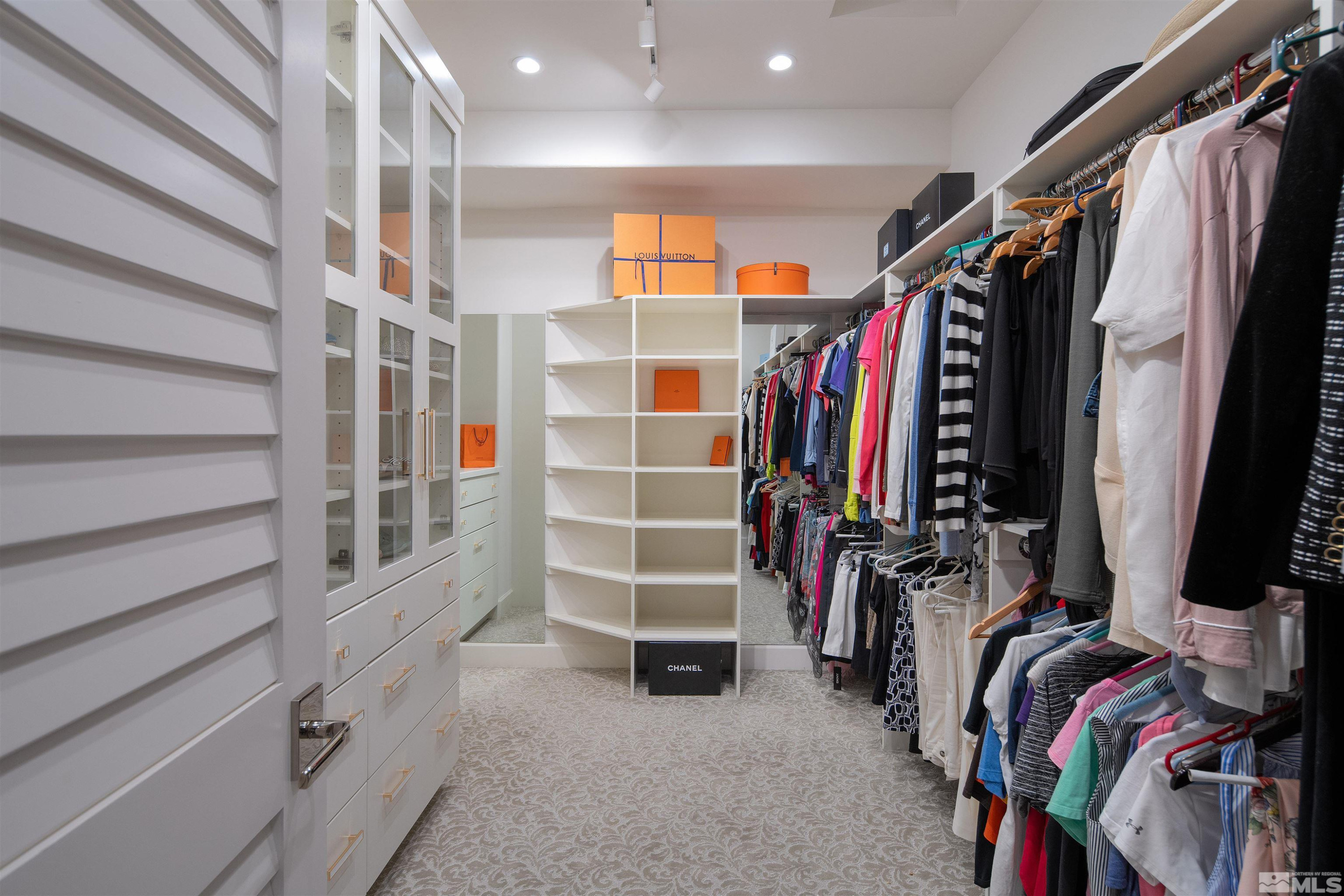 4305 Juniper Trail Reno, NV 89519 - Photo 10 of 30 a view of walk in closet with clothes and shoes
