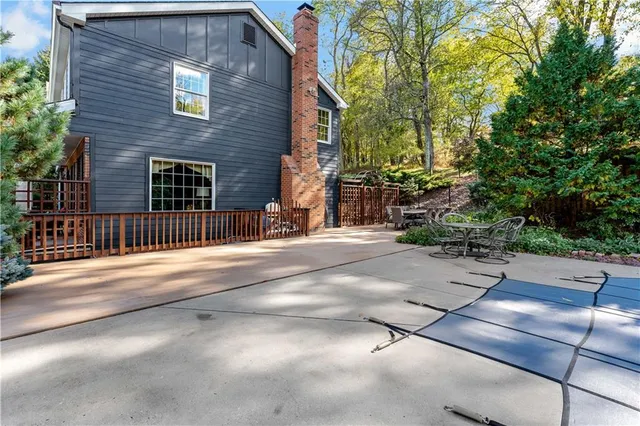 a view of a brick house with a street