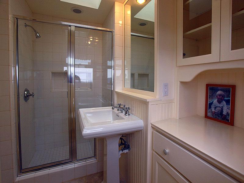 16 Rubio Road Santa Barbara, CA 93103 - Photo 11 of 23 a bathroom with a sink and a mirror