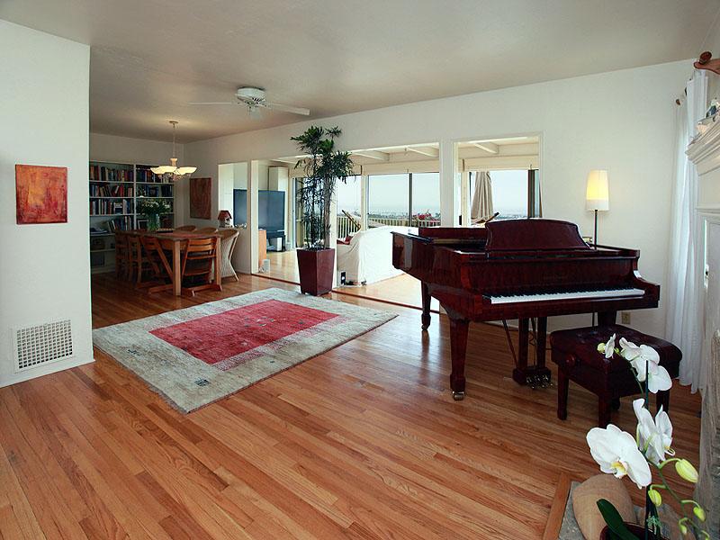 16 Rubio Road Santa Barbara, CA 93103 - Photo 3 of 23 a living room with furniture a dining table and kitchen view