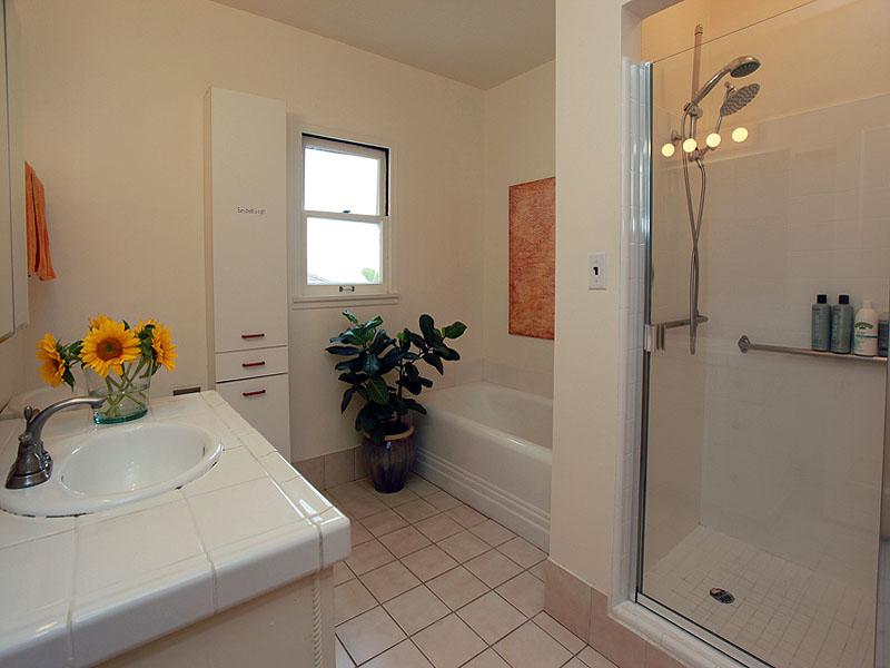 16 Rubio Road Santa Barbara, CA 93103 - Photo 10 of 23 a bathroom with a sink a toilet and shower