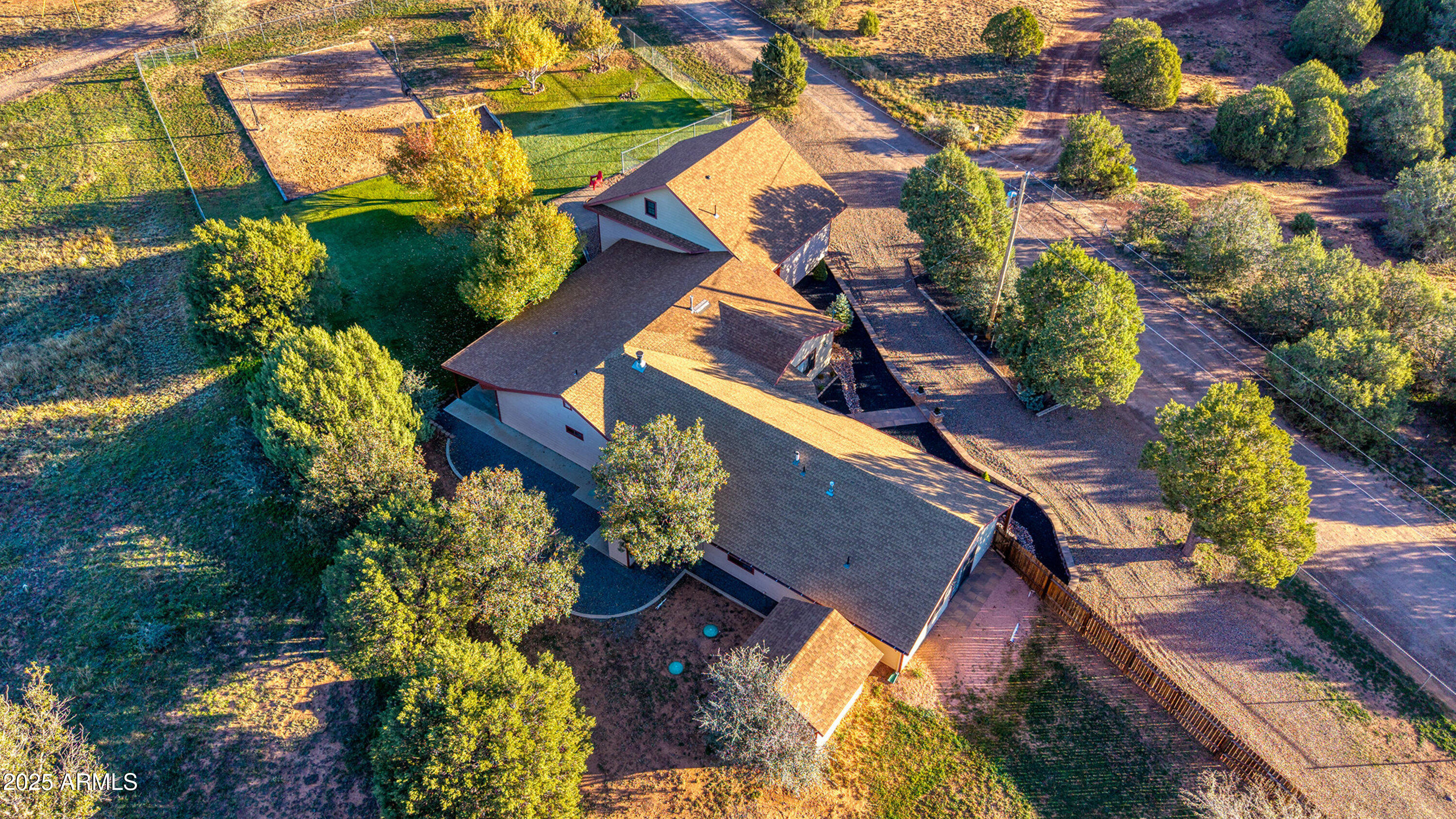 981 Oak Grove Road Show Low, AZ 85901 - Photo 11 of 61 an aerial view of a house with a yard and garden