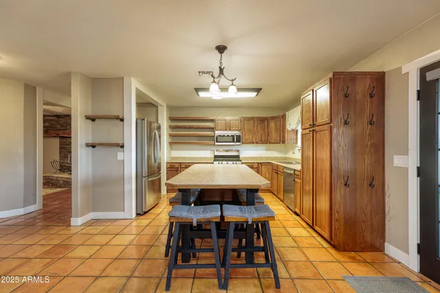 a view of a dining room with furniture