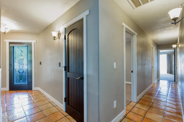 a bathroom with a tub and shower