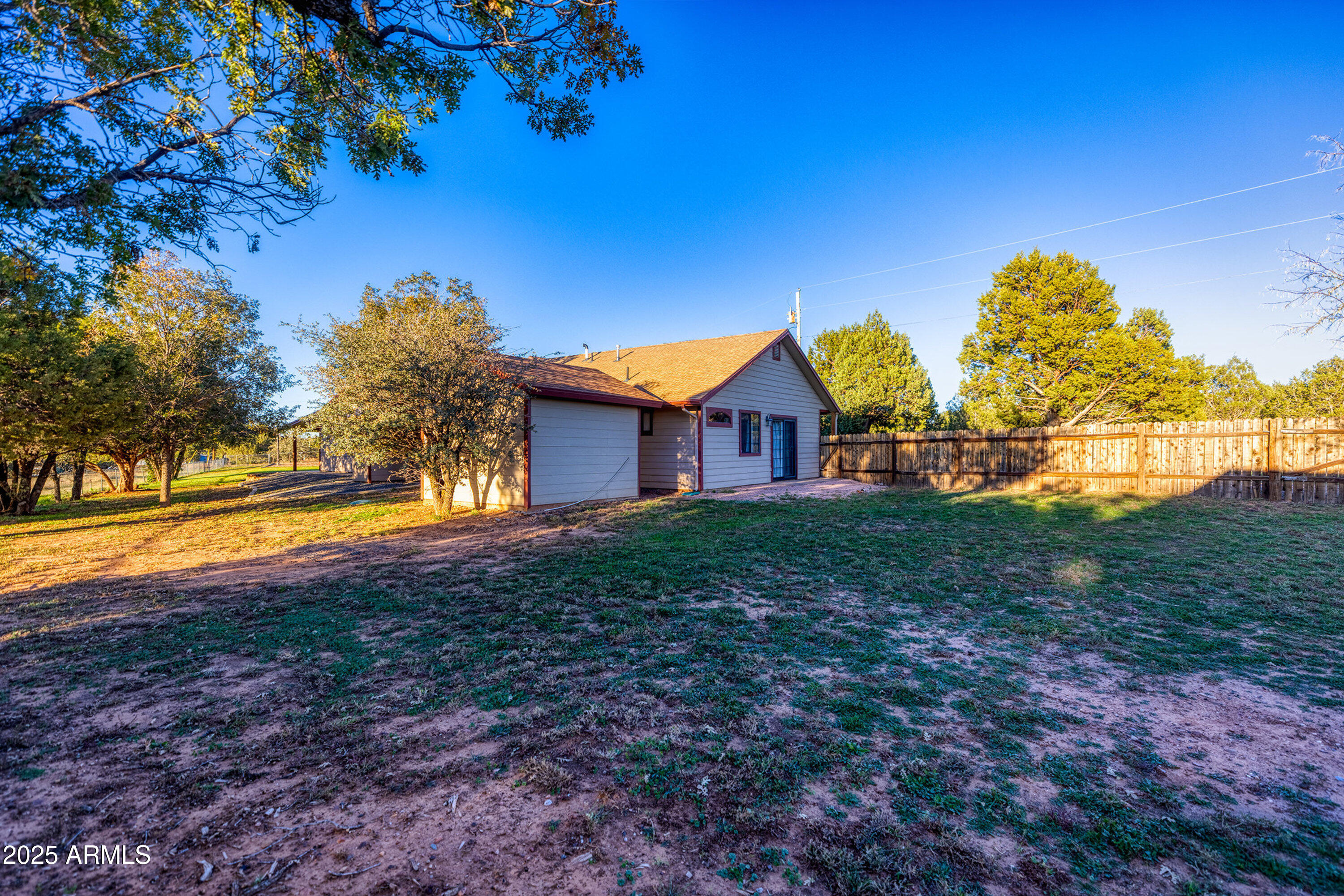 981 Oak Grove Road Show Low, AZ 85901 - Photo 53 of 61 a view of a house with a yard