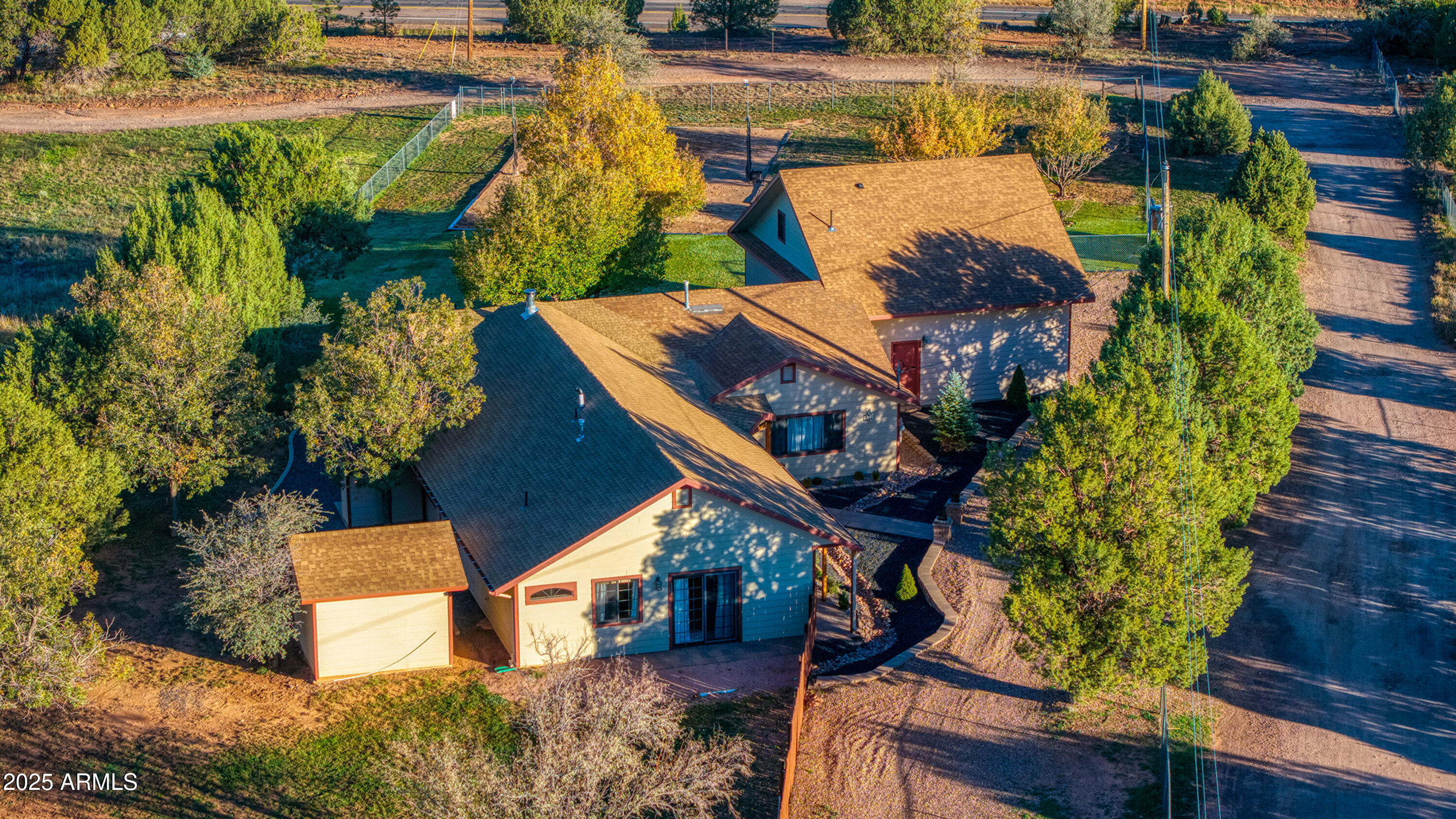 981 Oak Grove Road Show Low, AZ 85901 - Photo 10 of 61 an aerial view of a house with a yard