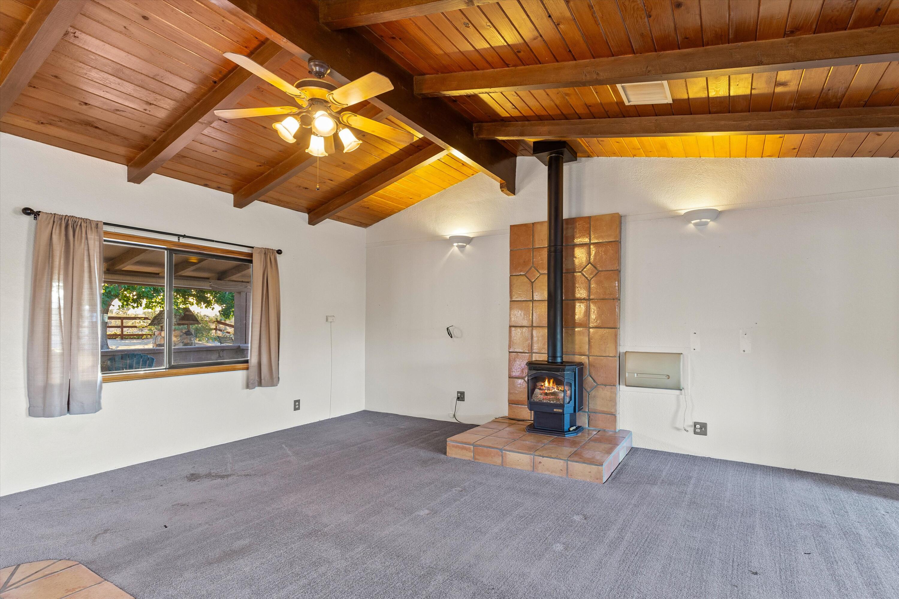 6785 Saddleback Road Joshua Tree, CA 92252 - Photo 17 of 50 a view of empty room with wooden floor and windows