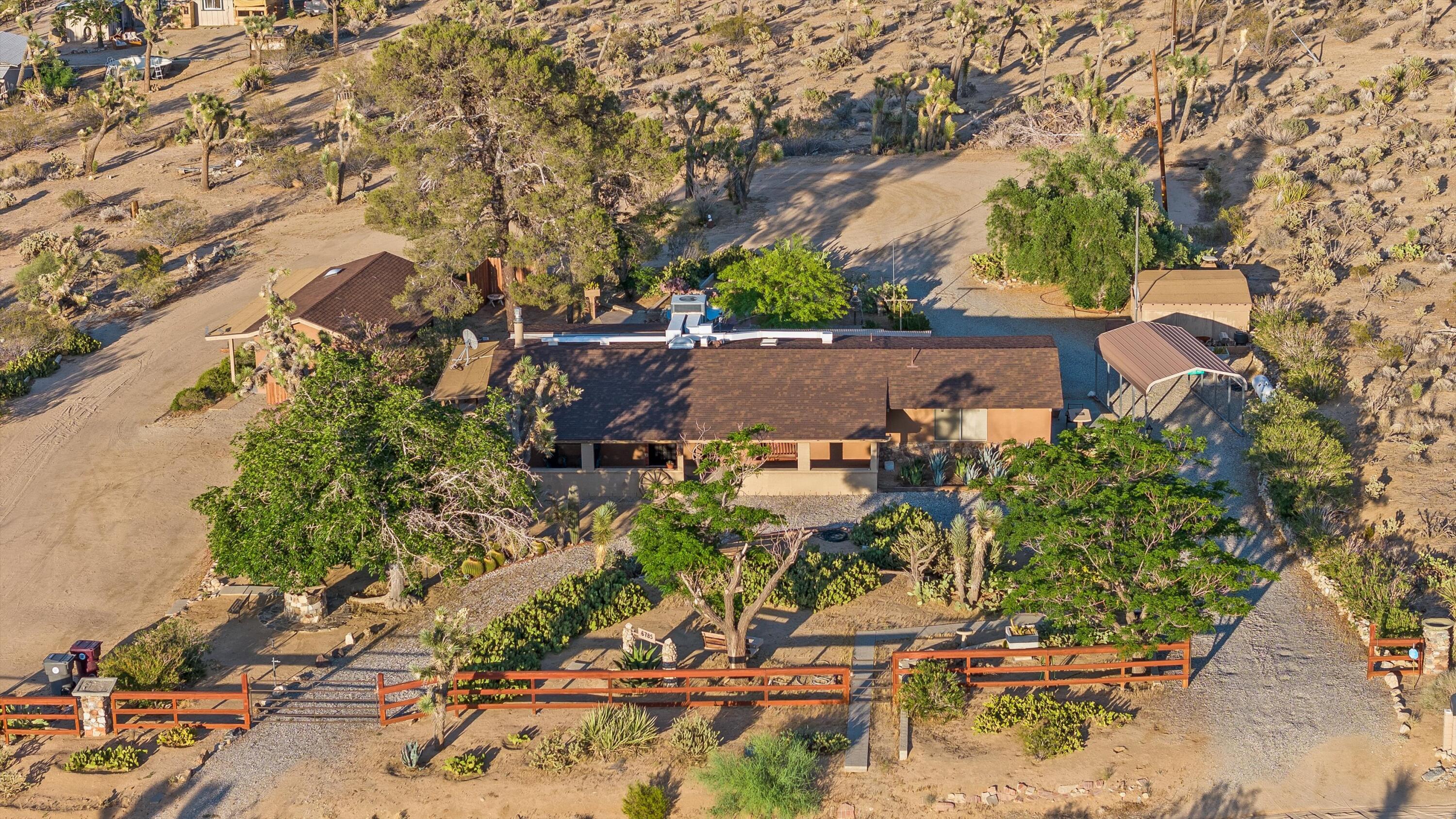 6785 Saddleback Road Joshua Tree, CA 92252 - Photo 47 of 50 an aerial view of a house with a yard basket ball court and outdoor seating