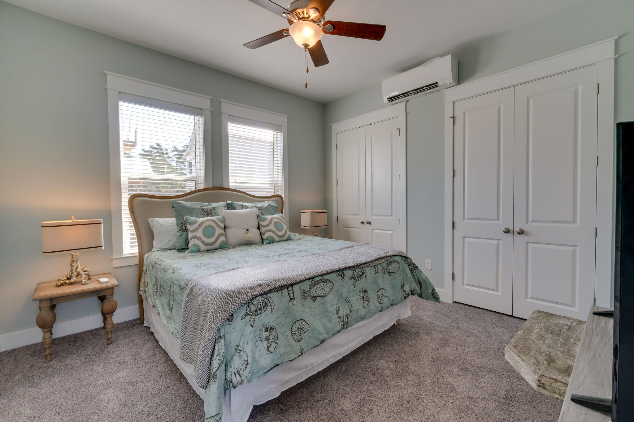 Lot 18 Beach View Dr Inlet Beach Inlet Beach, FL 32461 - Photo 16 of 41 a bedroom with a bed and a chandelier