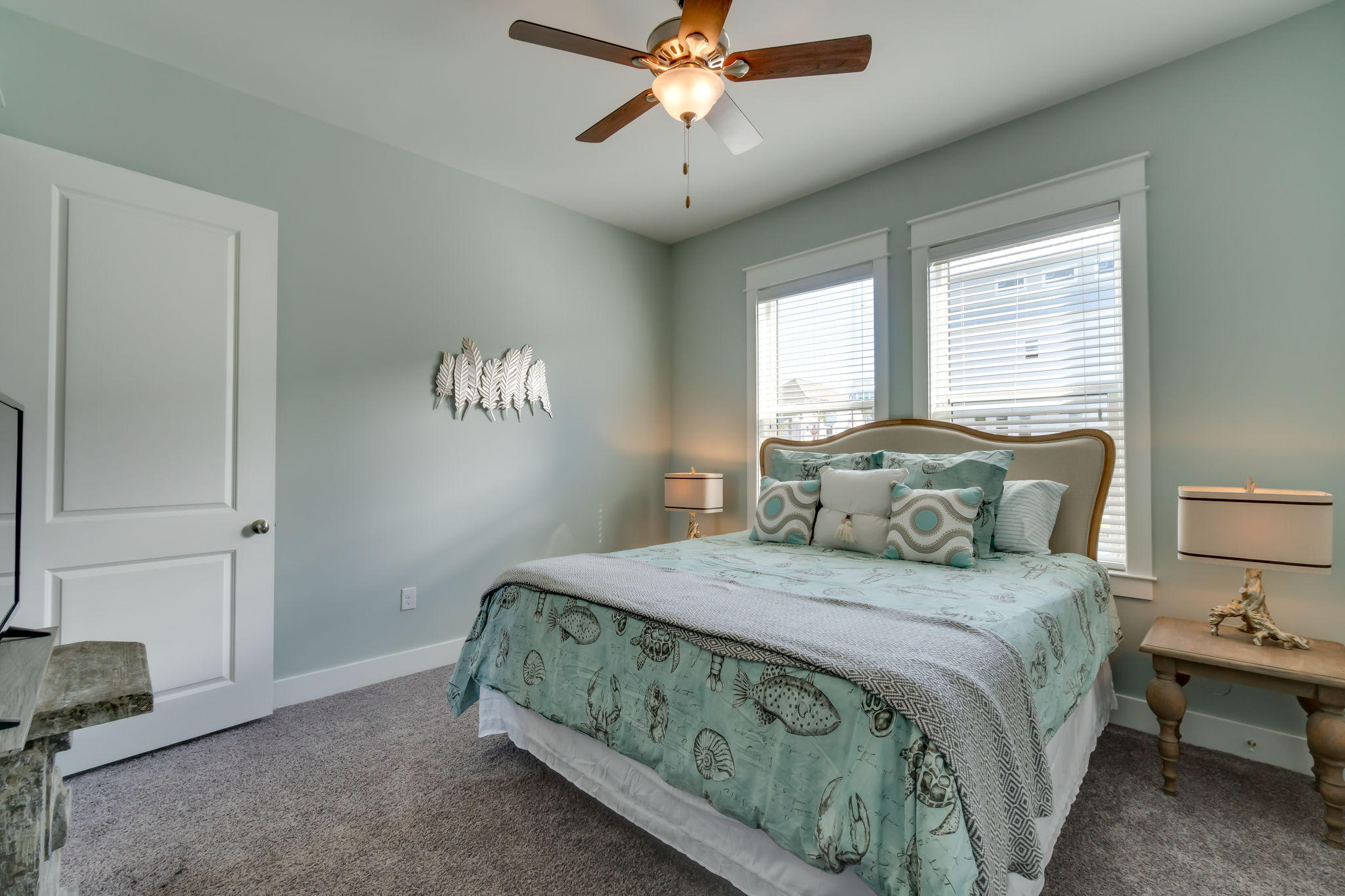 Lot 18 Beach View Dr Inlet Beach Inlet Beach, FL 32461 - Photo 17 of 41 a bedroom with a bed and a chandelier