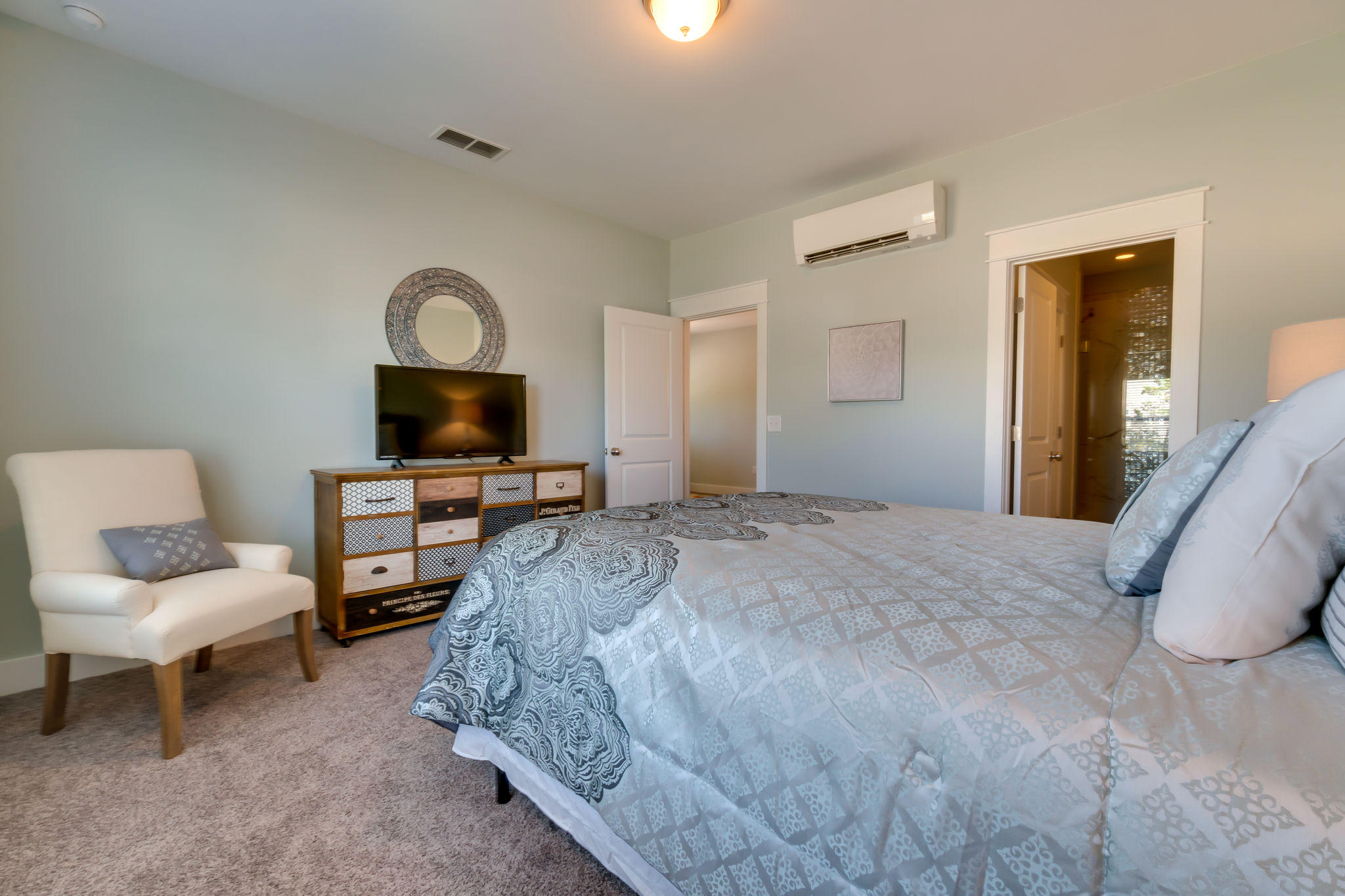 Lot 18 Beach View Dr Inlet Beach Inlet Beach, FL 32461 - Photo 26 of 41 a bedroom with a bed and a chair