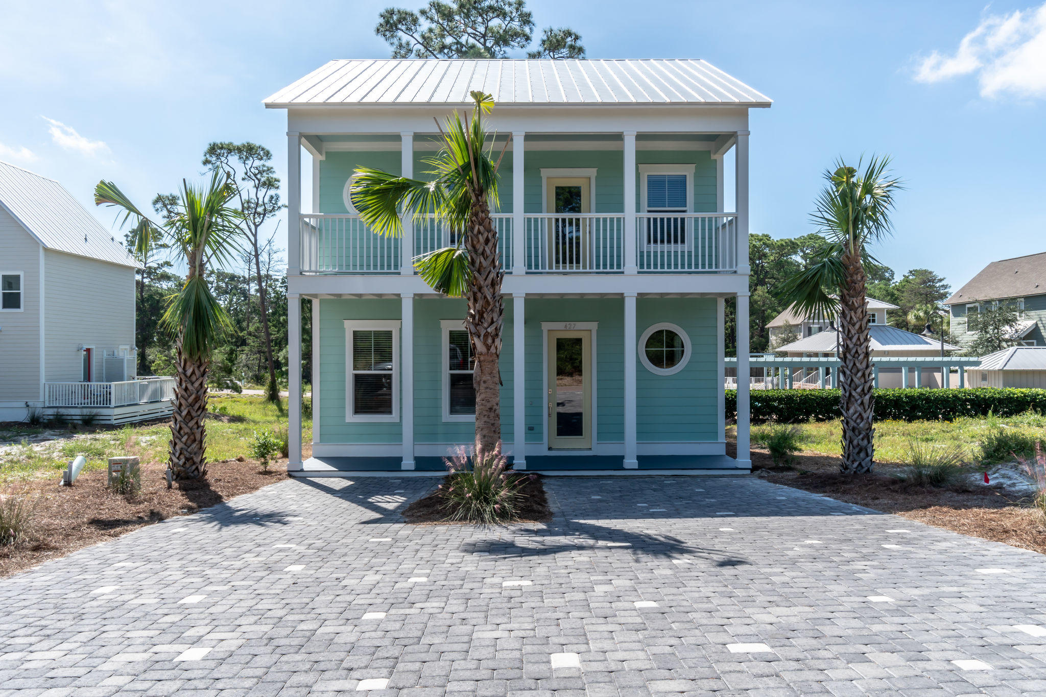 Lot 18 Beach View Dr Inlet Beach Inlet Beach, FL 32461 - Photo 3 of 41 a front view of a house with garden