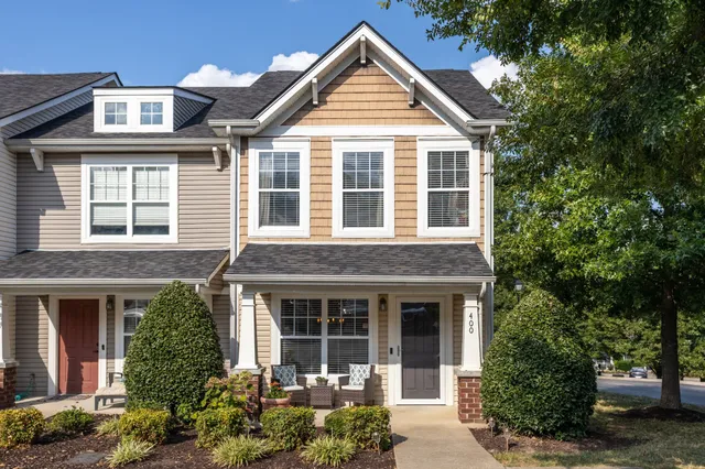 front view of a house with a yard