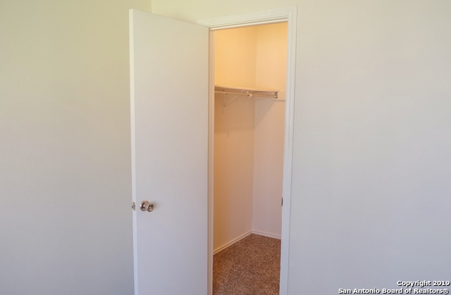 12250 Ridge Crown Street San Antonio, TX 78247 - Photo 12 of 15 a view of a bedroom