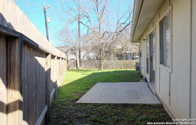 12250 Ridge Crown Street San Antonio, TX 78247 - Photo 14 of 15 a view of a back yard of the house