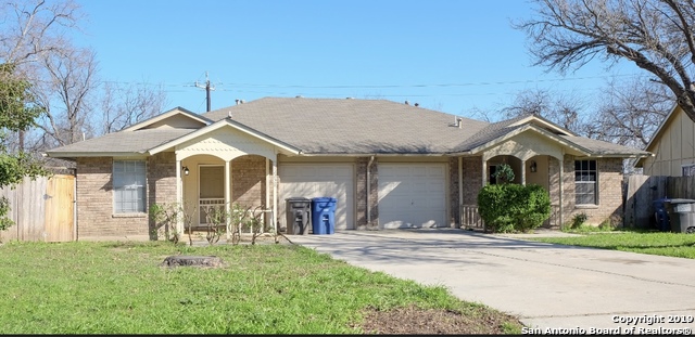 12250 Ridge Crown Street San Antonio, TX 78247 - Photo 2 of 15 a view of a house with a yard and plants