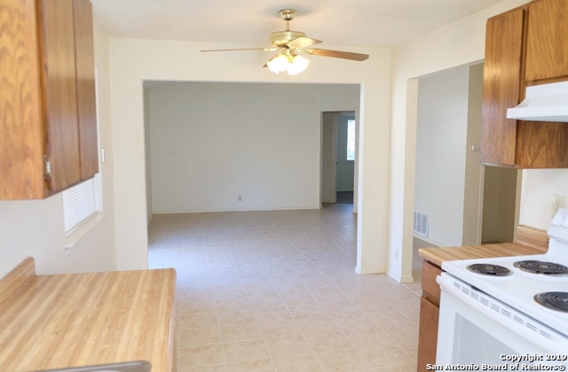 12250 Ridge Crown Street San Antonio, TX 78247 - Photo 5 of 15 a view of kitchen and hallway