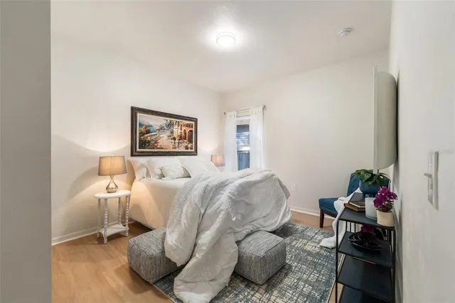 a bed room with a bed and a couch