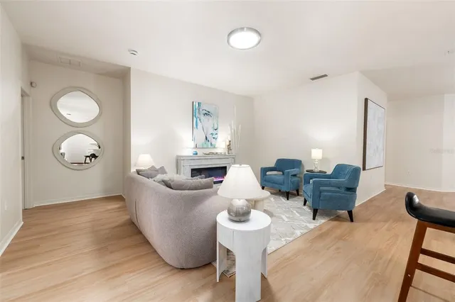 a living room with furniture and a window