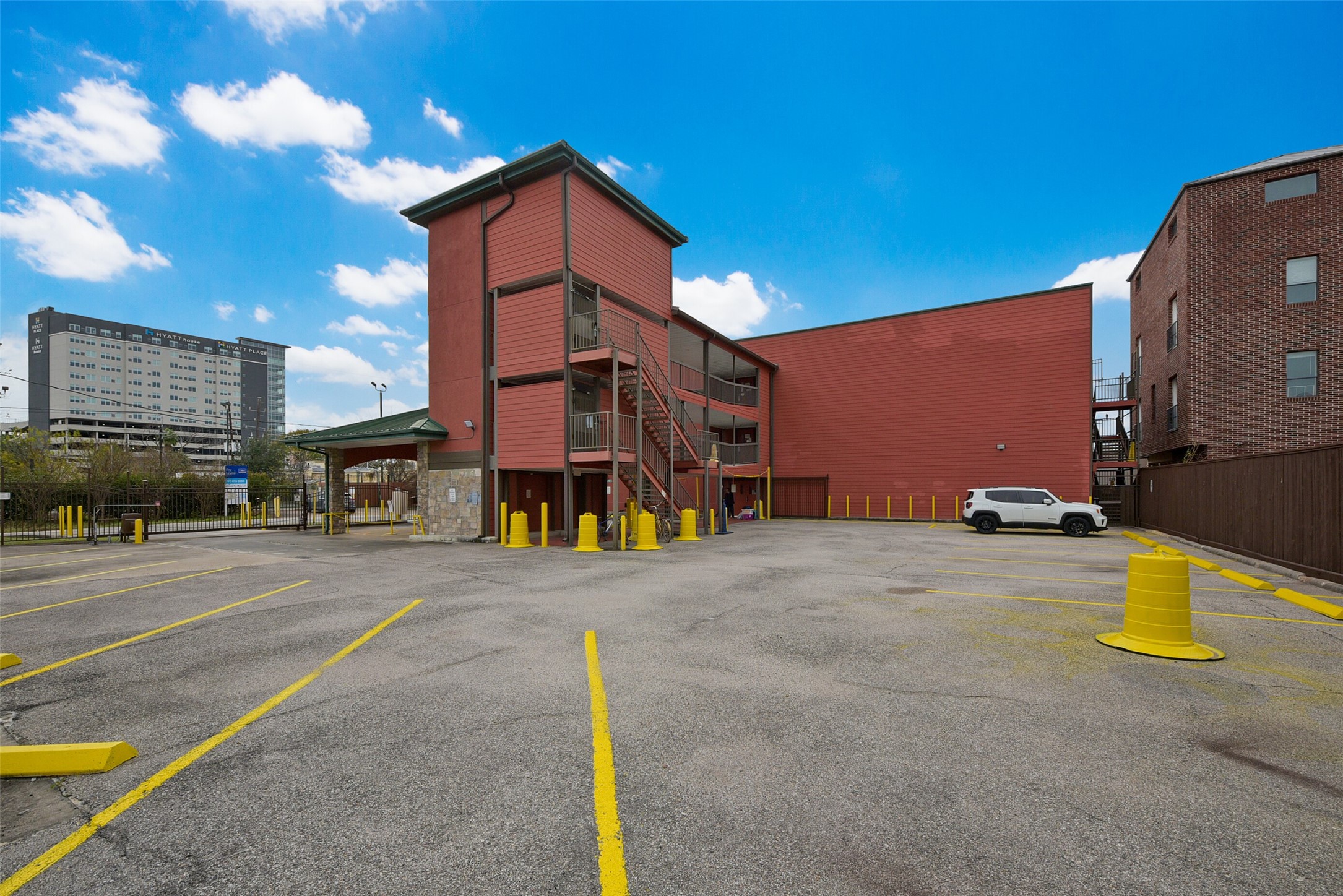 1025 Swanson Street, Unit 313 Houston, TX 77030 - Photo 2 of 25 a view of a street with houses