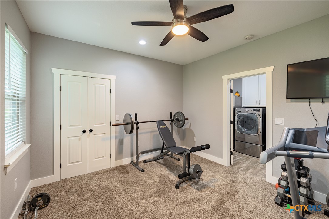200 Wood Cove Georgetown, TX 78633 - Photo 20 of 22 a view of a workspace with furniture and a window