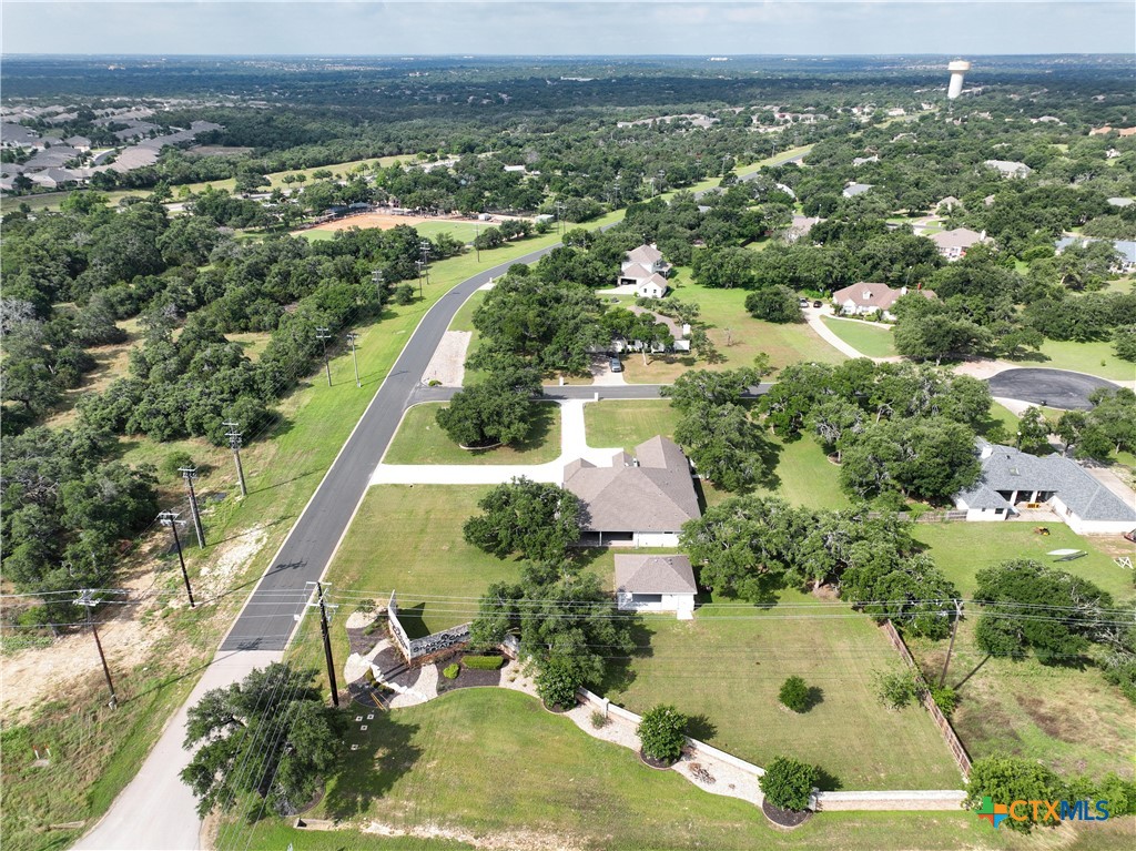 200 Wood Cove Georgetown, TX 78633 - Photo 7 of 22 an aerial view of residential houses with outdoor space and trees