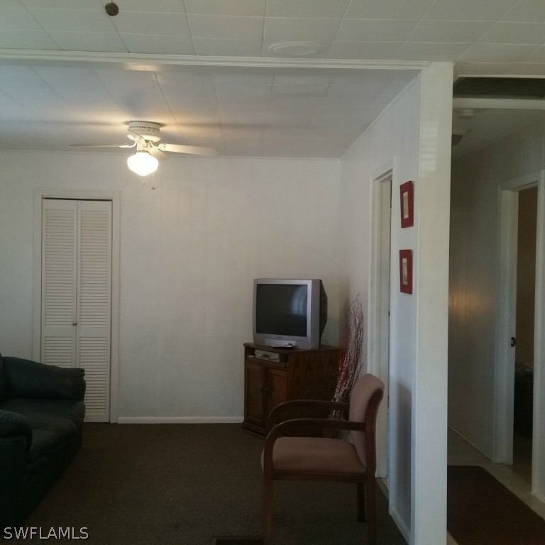 15272 Stringfellow Road Bokeelia, FL 33922 - Photo 13 of 21 a view of a livingroom with a flat screen tv