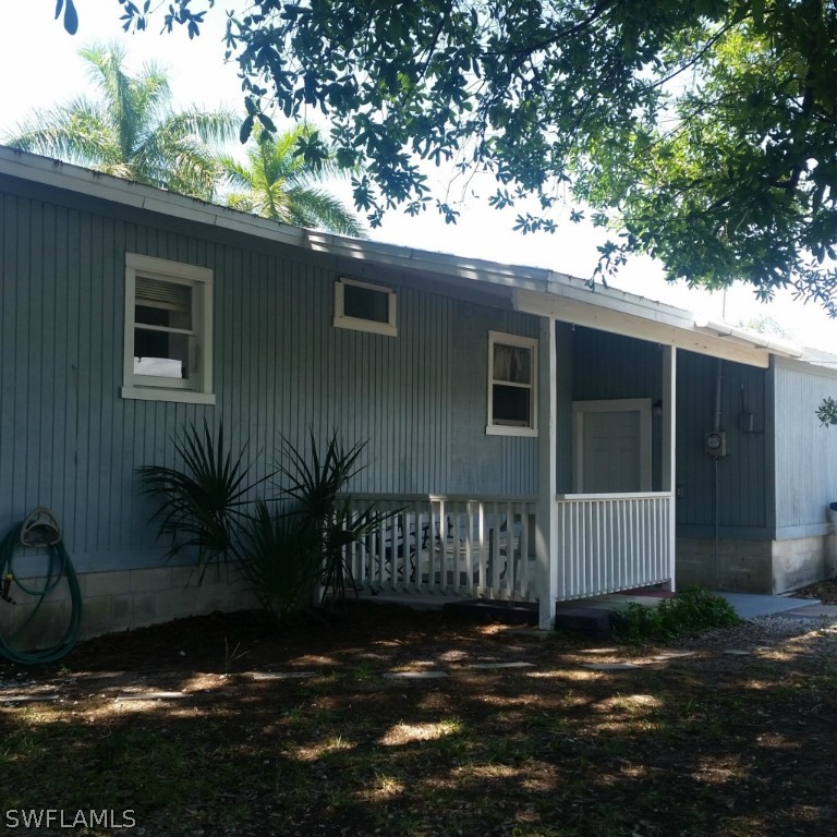 15272 Stringfellow Road Bokeelia, FL 33922 - Photo 8 of 21 a front view of a house