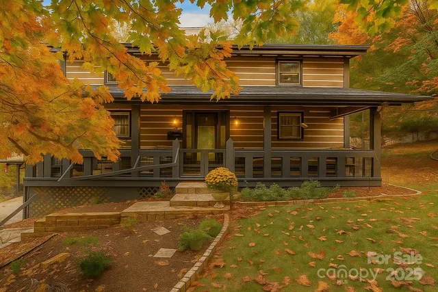 a front view of a house with glass windows