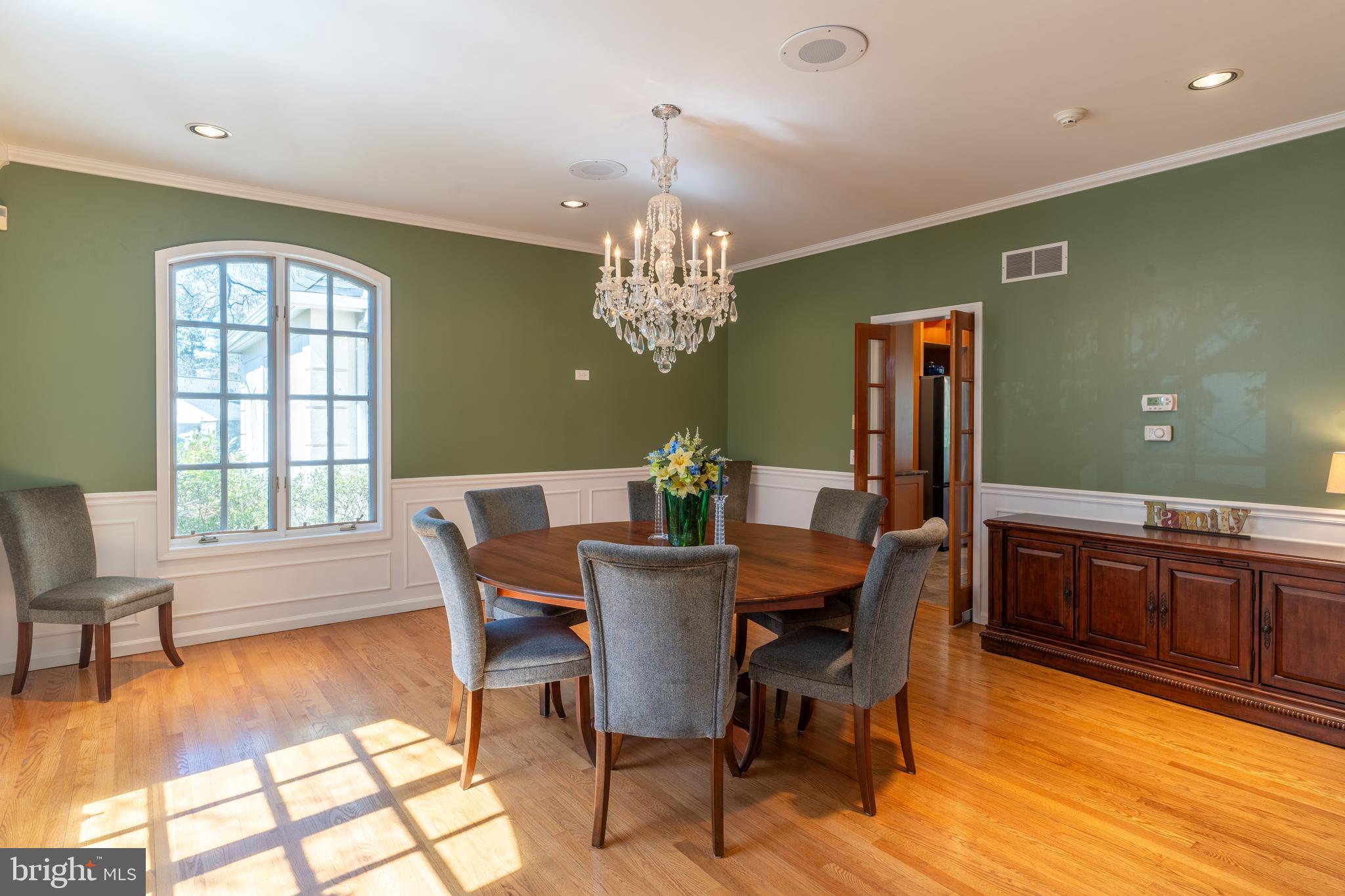 925 Morgan Road Jenkintown, PA 19046 - Photo 12 of 83 a view of a dining room with furniture a chandelier and wooden floor