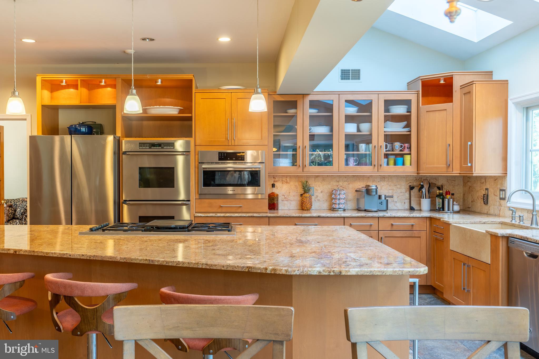 925 Morgan Road Jenkintown, PA 19046 - Photo 20 of 83 a kitchen with stainless steel appliances granite countertop a sink and a stove