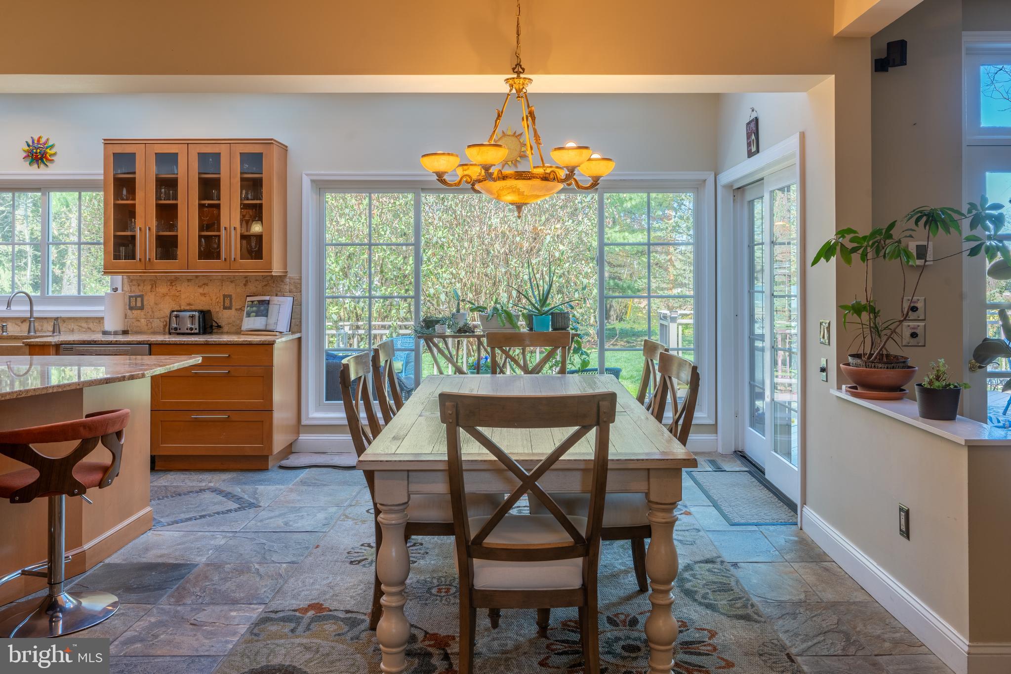 925 Morgan Road Jenkintown, PA 19046 - Photo 21 of 83 a dining room with furniture a chandelier and wooden floor