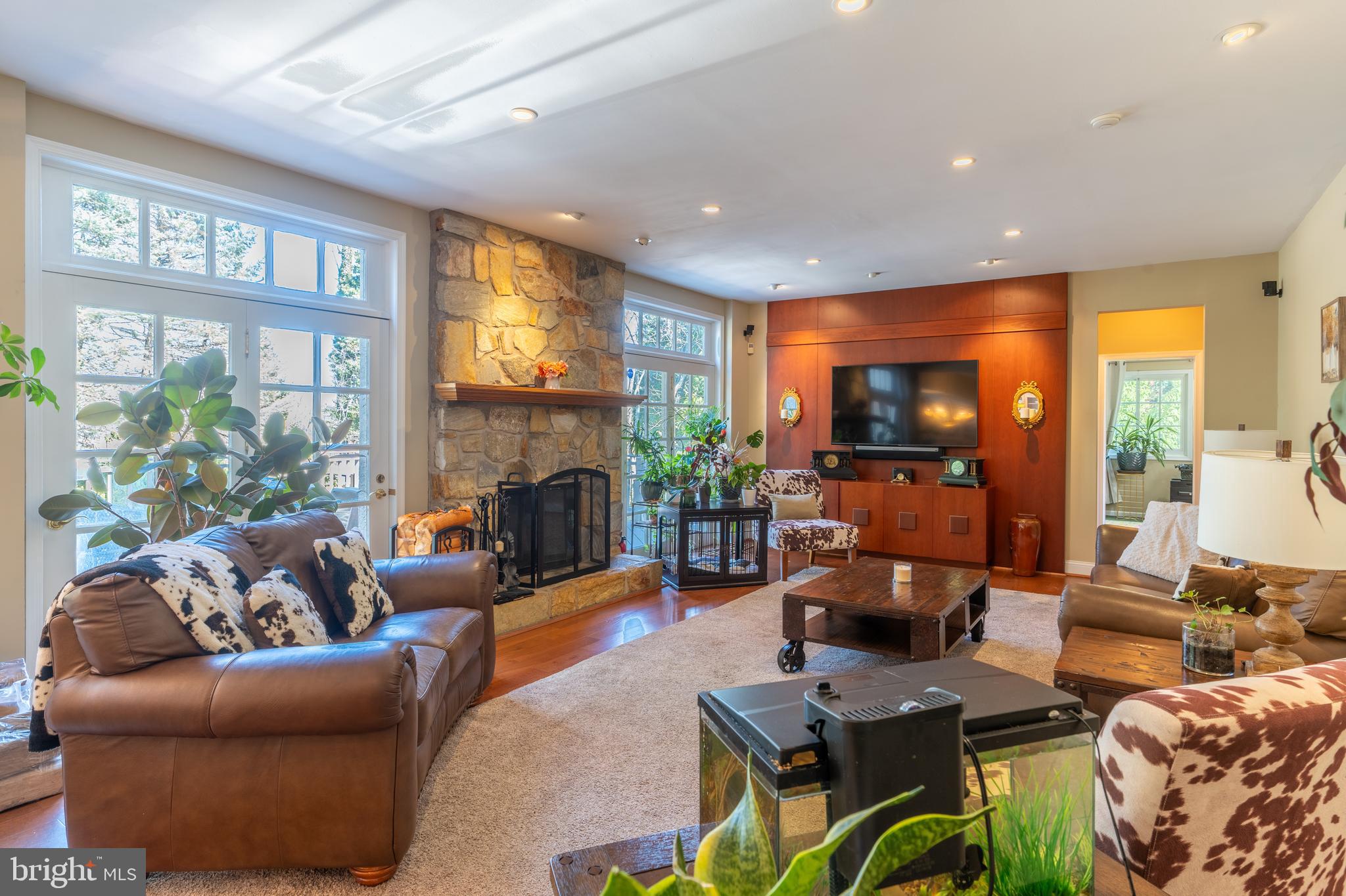 925 Morgan Road Jenkintown, PA 19046 - Photo 25 of 83 a living room with furniture fireplace and a large window