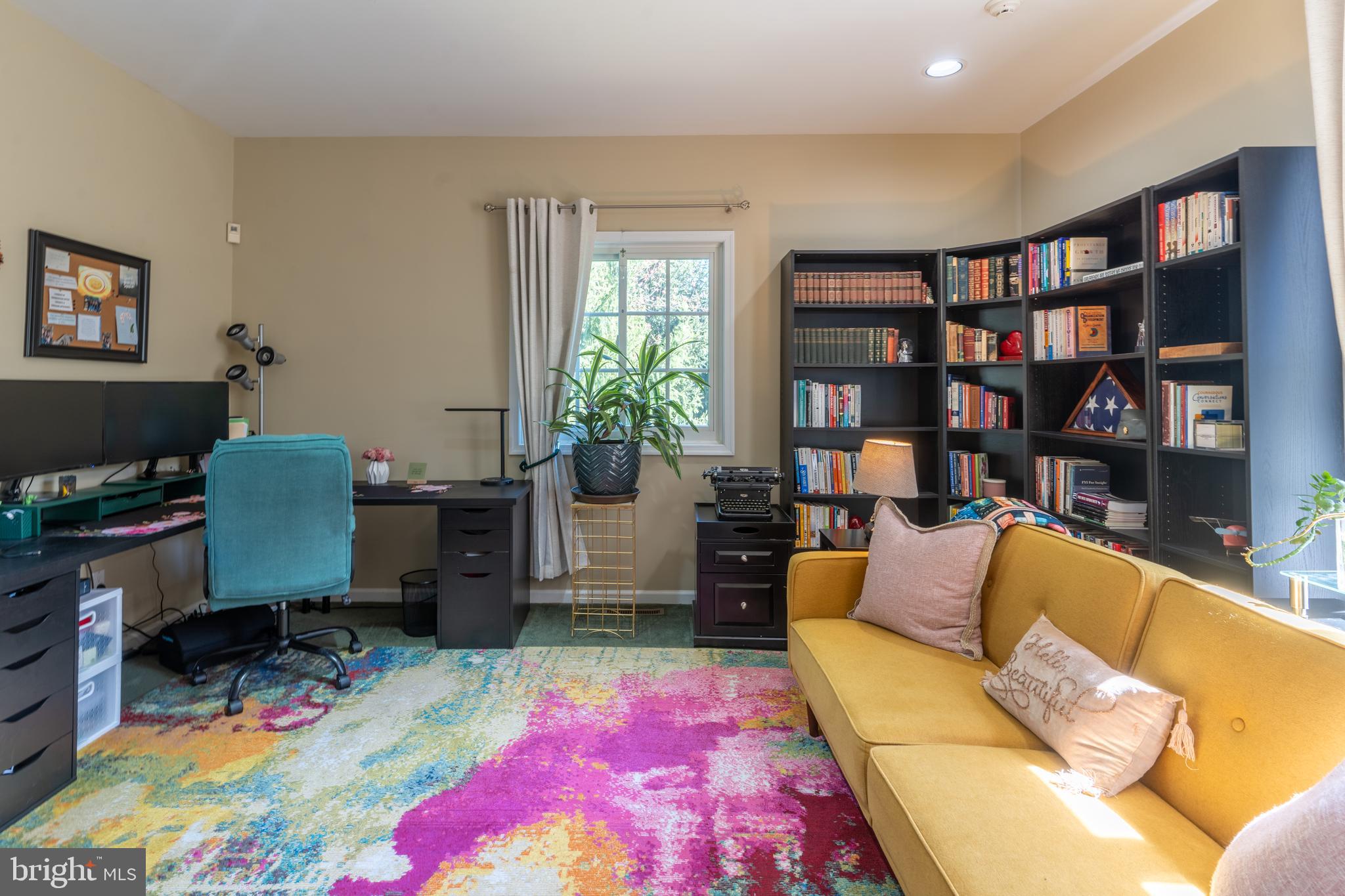 925 Morgan Road Jenkintown, PA 19046 - Photo 30 of 83 a living room with furniture and a book shelf