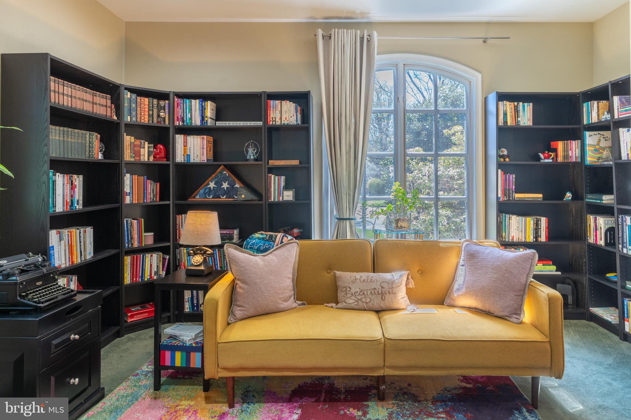 925 Morgan Road Jenkintown, PA 19046 - Photo 31 of 83 a living room with furniture a book shelf and a book shelf