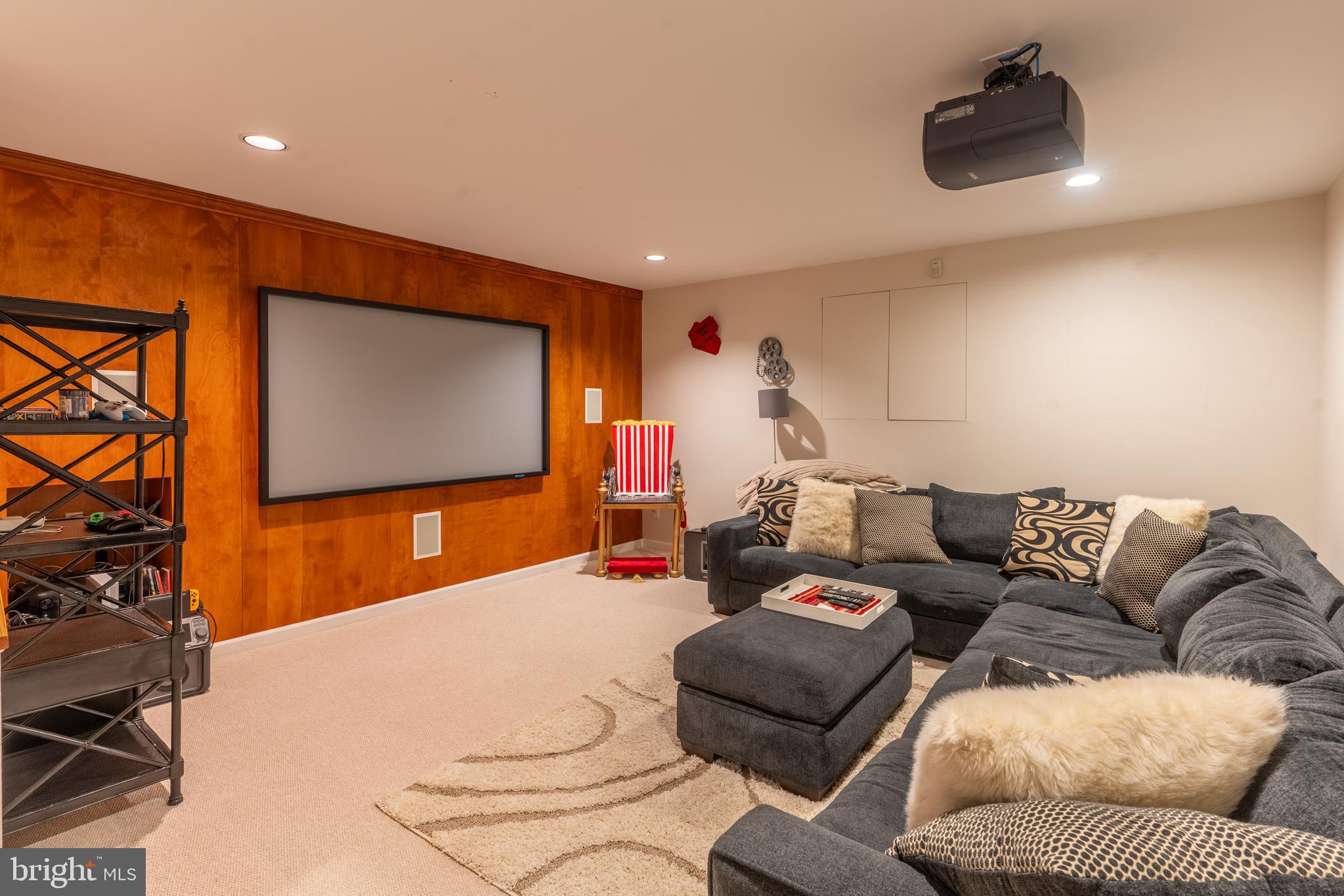 925 Morgan Road Jenkintown, PA 19046 - Photo 38 of 83 a living room with furniture and a flat screen tv