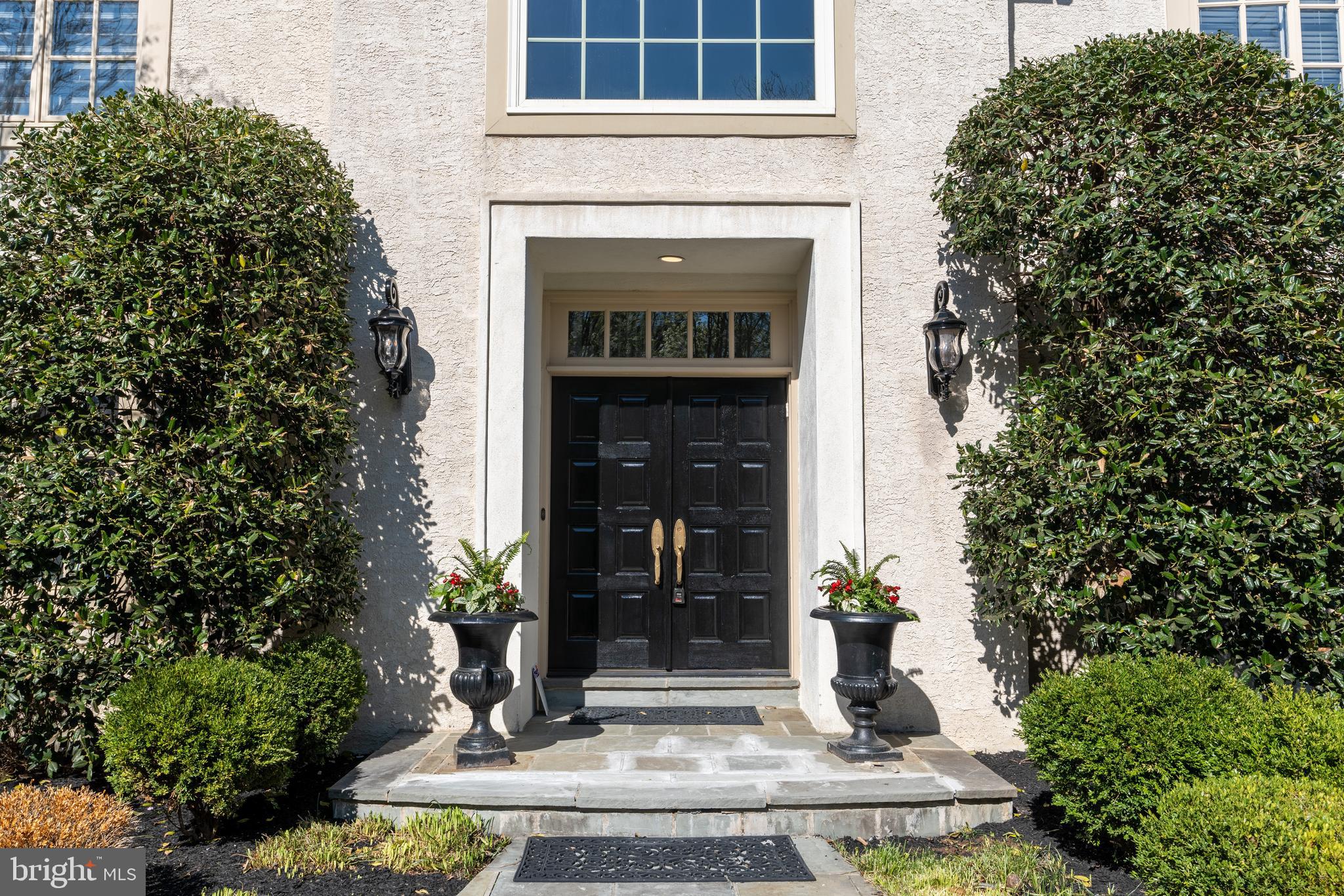 925 Morgan Road Jenkintown, PA 19046 - Photo 5 of 83 a front view of a house with garden