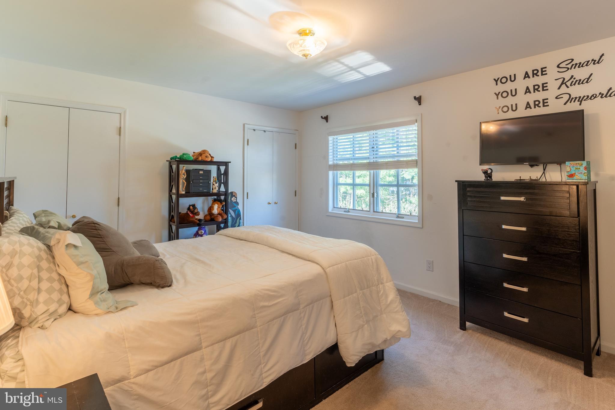 925 Morgan Road Jenkintown, PA 19046 - Photo 62 of 83 a bedroom with a bed and a flat tv screen