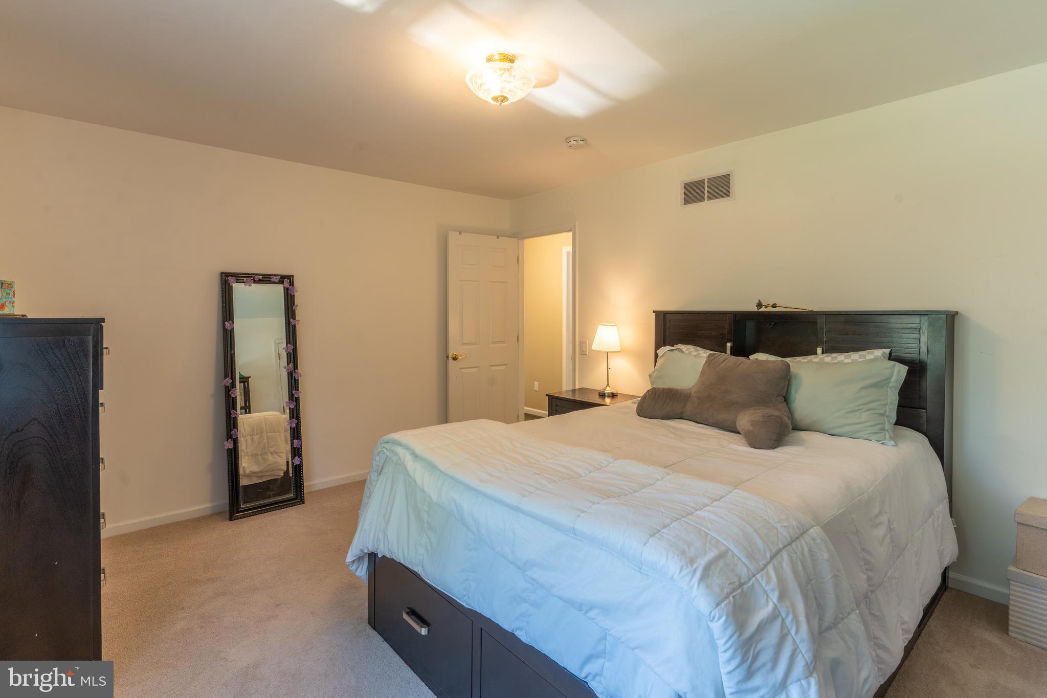925 Morgan Road Jenkintown, PA 19046 - Photo 63 of 83 a bedroom with a bed and a walk in closet
