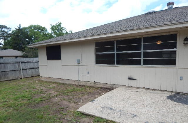 6402 Brookgate Drive Spring, TX 77373 - Photo 13 of 17 a view of a house with a backyard and a window