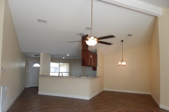 6402 Brookgate Drive Spring, TX 77373 - Photo 6 of 17 a view of a room with a hanging light and kitchen