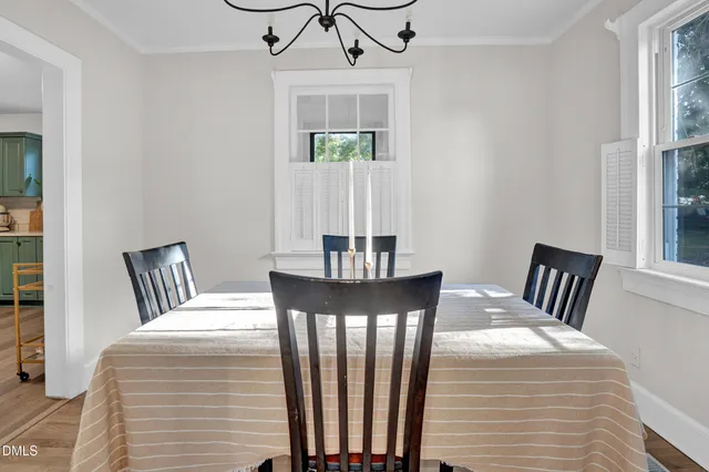 a bedroom with furniture and window