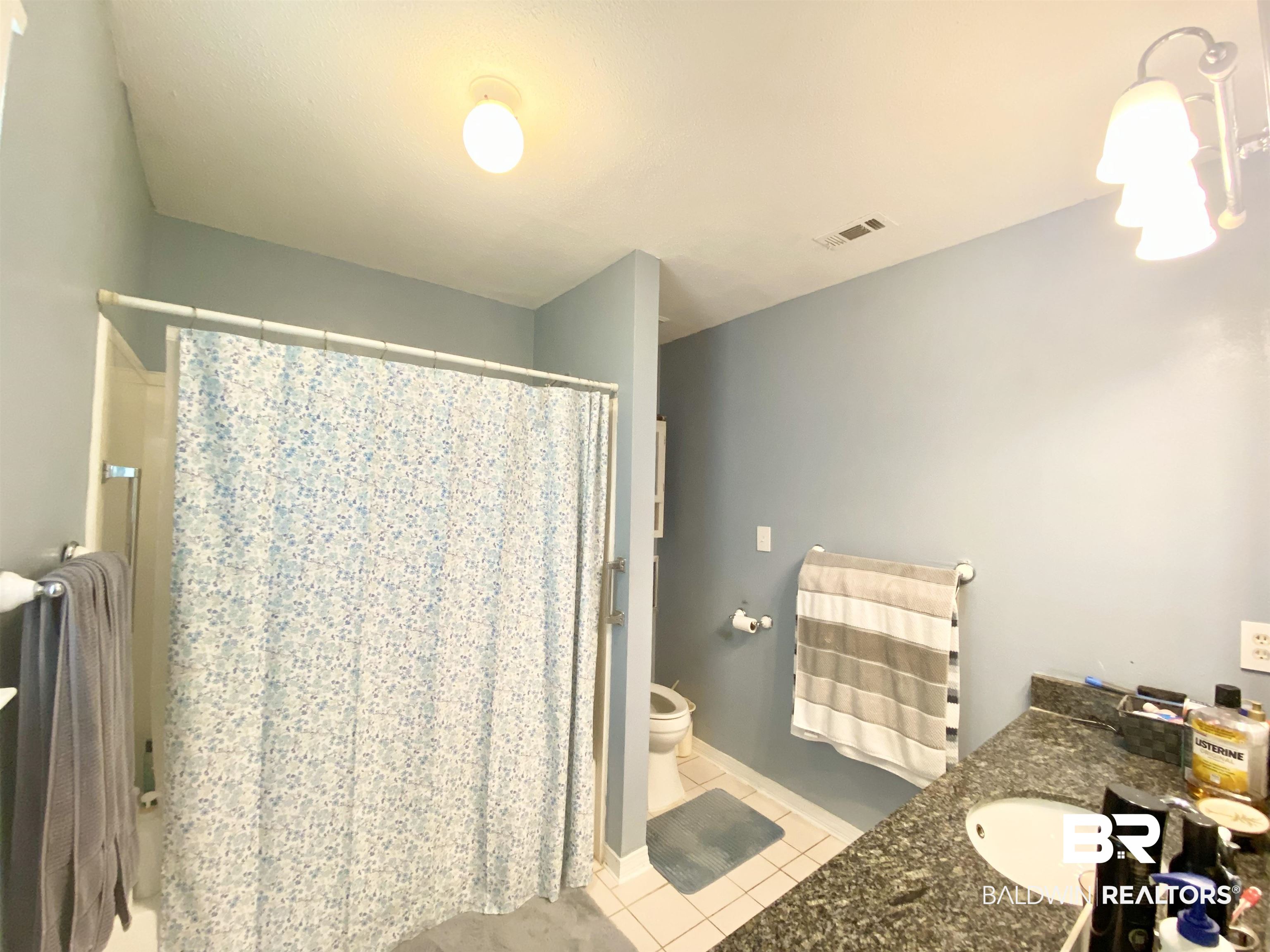 2 Windgate Court Foley, AL 36535 - Photo 17 of 28 Bathroom with tile flooring, vanity, and toilet