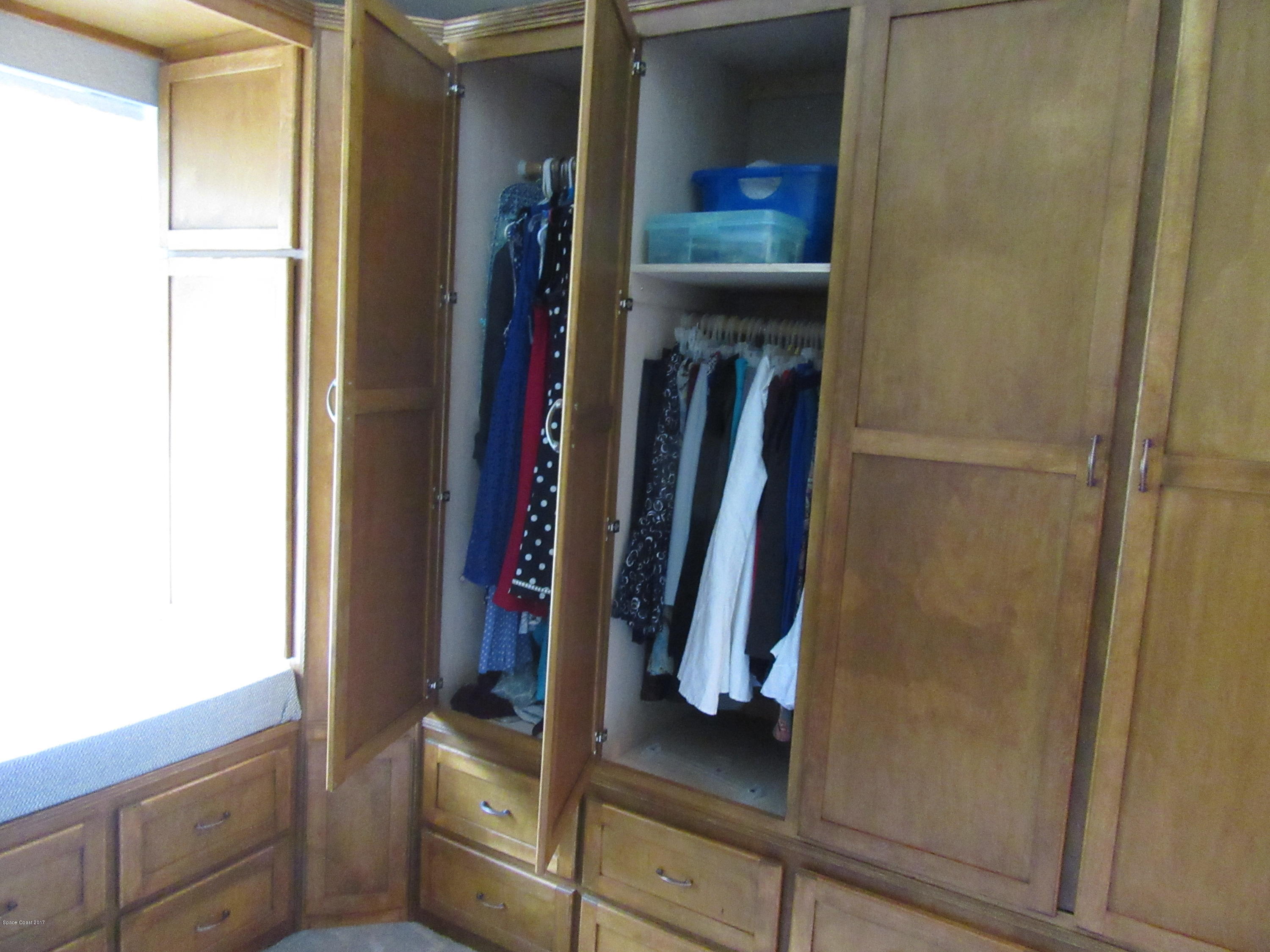 3100 Davis Road Mims, FL 32754 - Photo 20 of 54 Custom Cabinetry in Closet