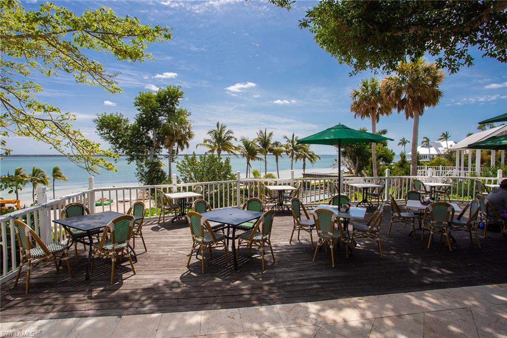 143 Useppa Island Bokeelia, FL 33922 - Photo 20 of 22 Wooden deck featuring outdoor dining space