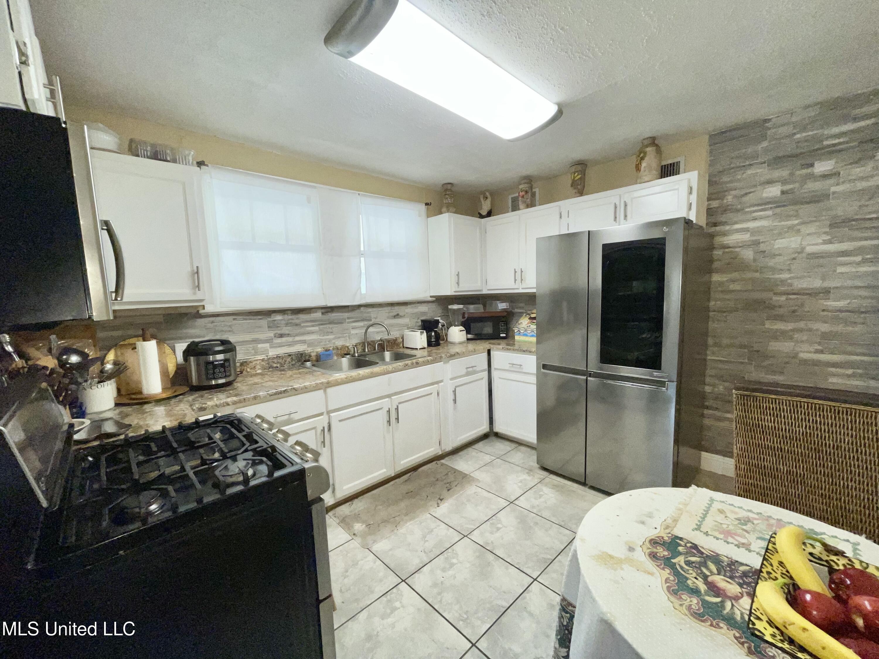 4124 Griffin Street Moss Point, MS 39563 - Photo 8 of 35 IMG_2148