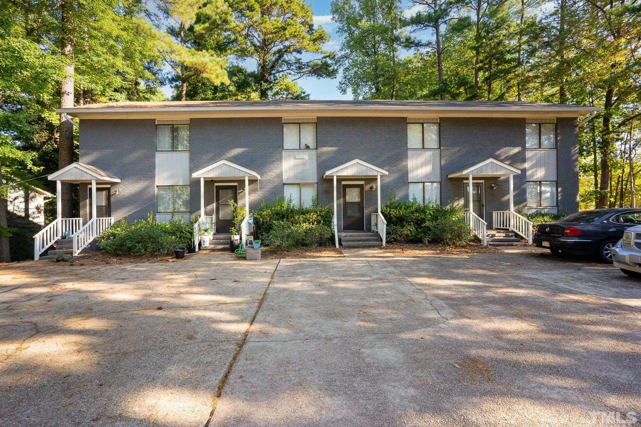 3700 Greenleaf Street Raleigh, NC 27606 - Photo 2 of 13 a front view of a house with a yard